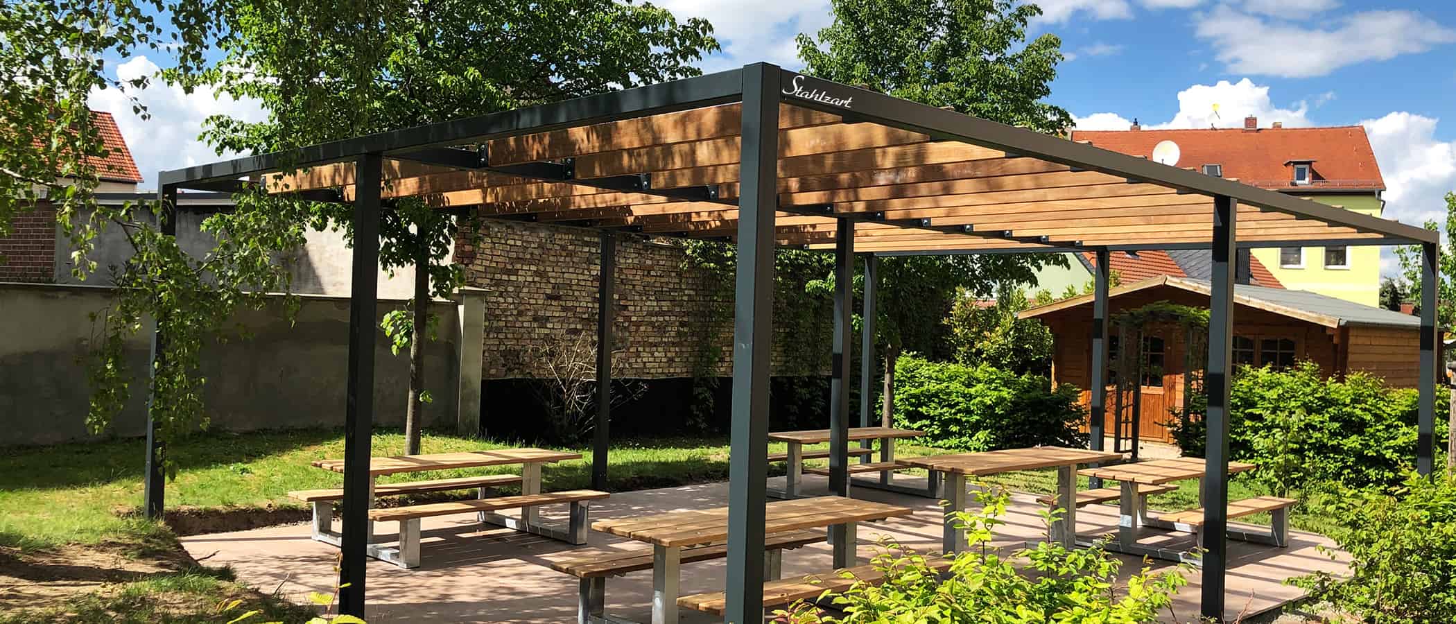 pergola-pavillon-gruenes-klassenzimmer-garten-dach-ueberdachung-stahl-material-holz-moebel-modern-design-stahlzart