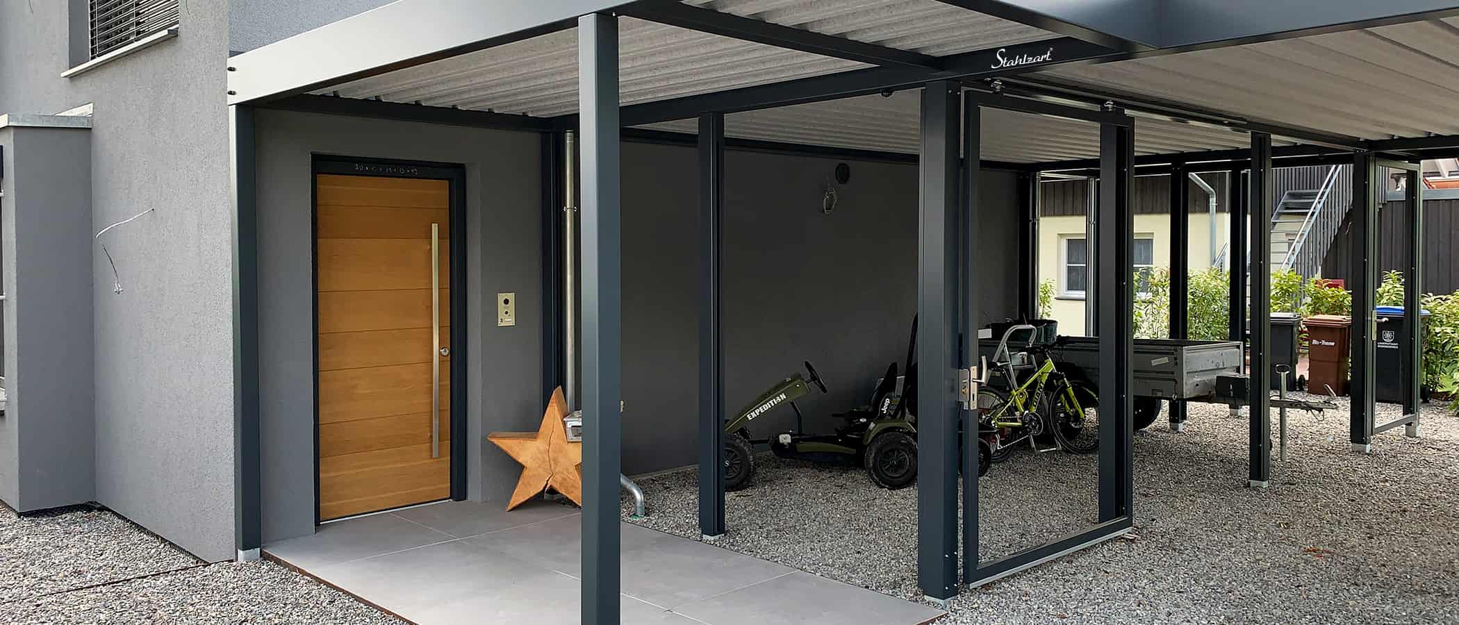 carport-nach-mass-haus-eingangsueberdachung-vordach-integration-doppelcarport-carports-metall-stahl-planung-lösung-individuell-garage-flachdach-stahzart