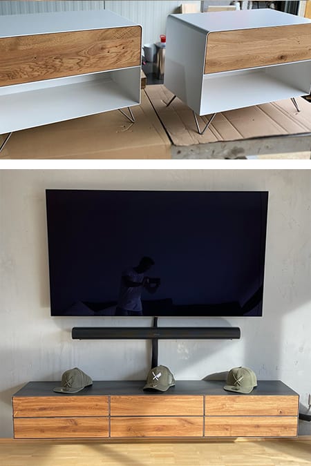 Schwebendes Medien-Lowboard aus Stahl an heller Betonwand: 3mm Stahlkorpus ist präzisionsgeschweißt für immense Lasten – Handgefertigt in Sachsen.