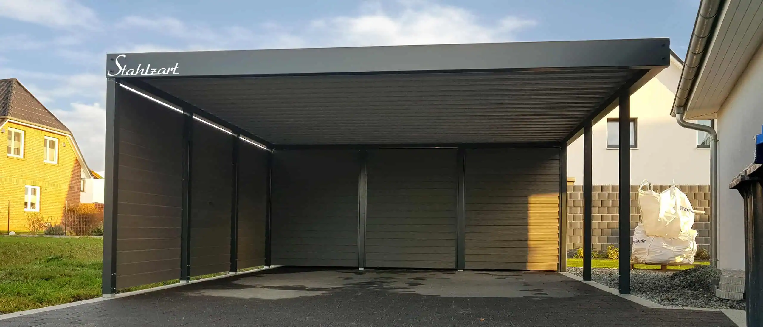 carport-doppelcarport-stahlcarport-wpc-carports-karlsruhe-preise-baugenehmigung-angebote-stahlzart-mit-geraeteraum-flachdach-seitlich-am-haus-designer carport-doppelcarport-stahlcarport-wpc-carports-karlsruhe-preise-baugenehmigung-angebote-stahlzart-mit-geraeteraum-flachdach-seitlich-am-haus-designer