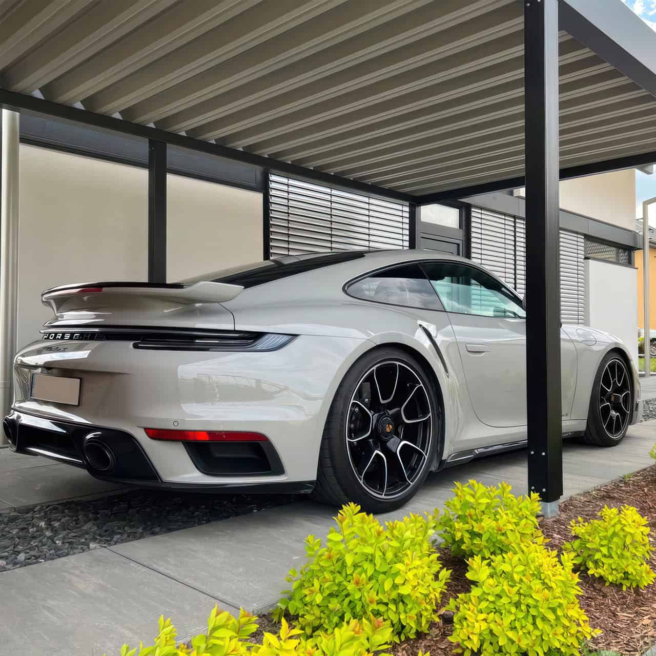 carport-metall-holz-mit-abstellraum-einzelcarport-plauen-stahlcarport-metallcarport-stahl-flachdach-trapezblech-anthrazit-modern-design-planen-konfigurator-porsche-911-stahlzart