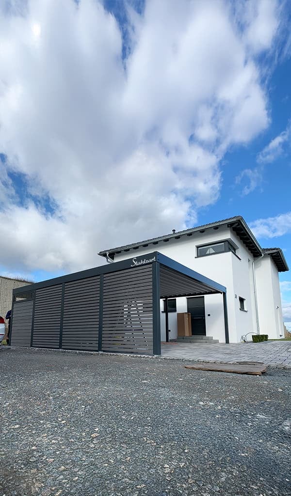 doppelcarport-stahl-wpc-anthrazit-mit-geraeteraum-carport-maerkisch-oderland-stahlcarport-am-haus-flachdach-anthrazit-wpc-seitenwand-bauen-stahlzart doppelcarport-stahl-wpc-anthrazit-mit-geraeteraum-carport-maerkisch-oderland-stahlcarport-am-haus-flachdach-anthrazit-wpc-seitenwand-bauen-stahlzart