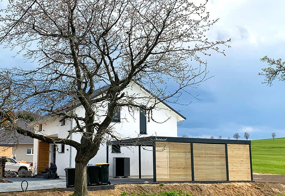 Doppelcarport aus Holz & Metall mit Abstellraum – Cottbus
